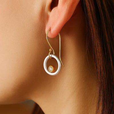 Boucles d'oreilles vintage en or et argent avec zirconia