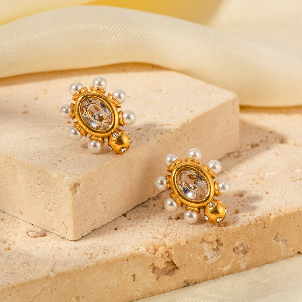 Élégantes boucles d'oreilles en or ornées de perles