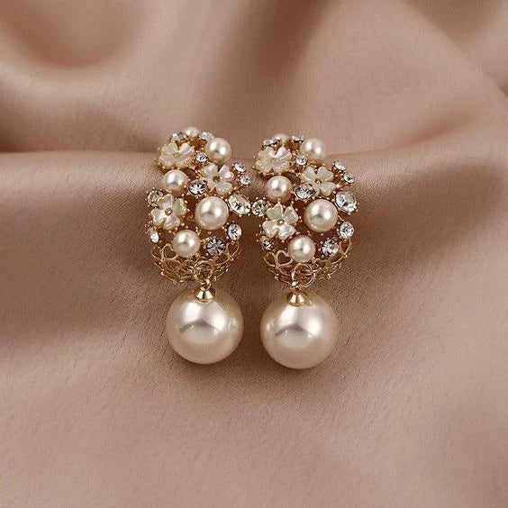 Élégantes boucles d'oreilles en perles florales