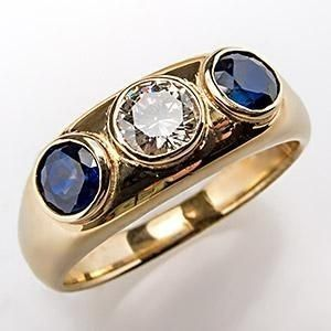 Bague en or ornée de zirconia bleu en verre