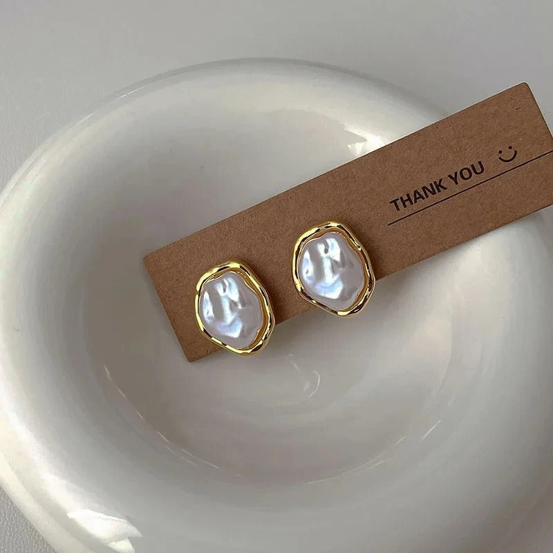Élégantes boucles d'oreilles en perles par Carmen