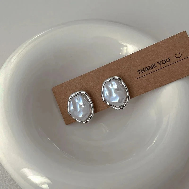 Élégantes boucles d'oreilles en perles par Carmen