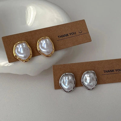 Élégantes boucles d'oreilles en perles par Carmen