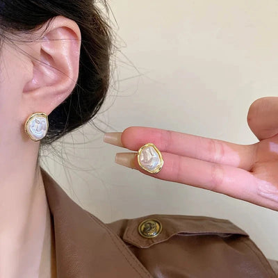 Élégantes boucles d'oreilles en perles par Carmen